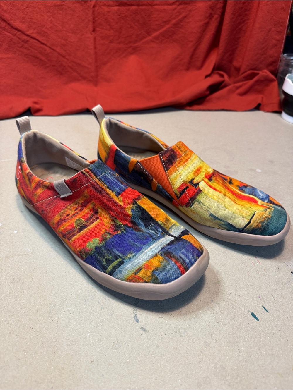 UIN Slip-On Canvas Shoes in Red, Orange, Yellow & Blue Abstract Print